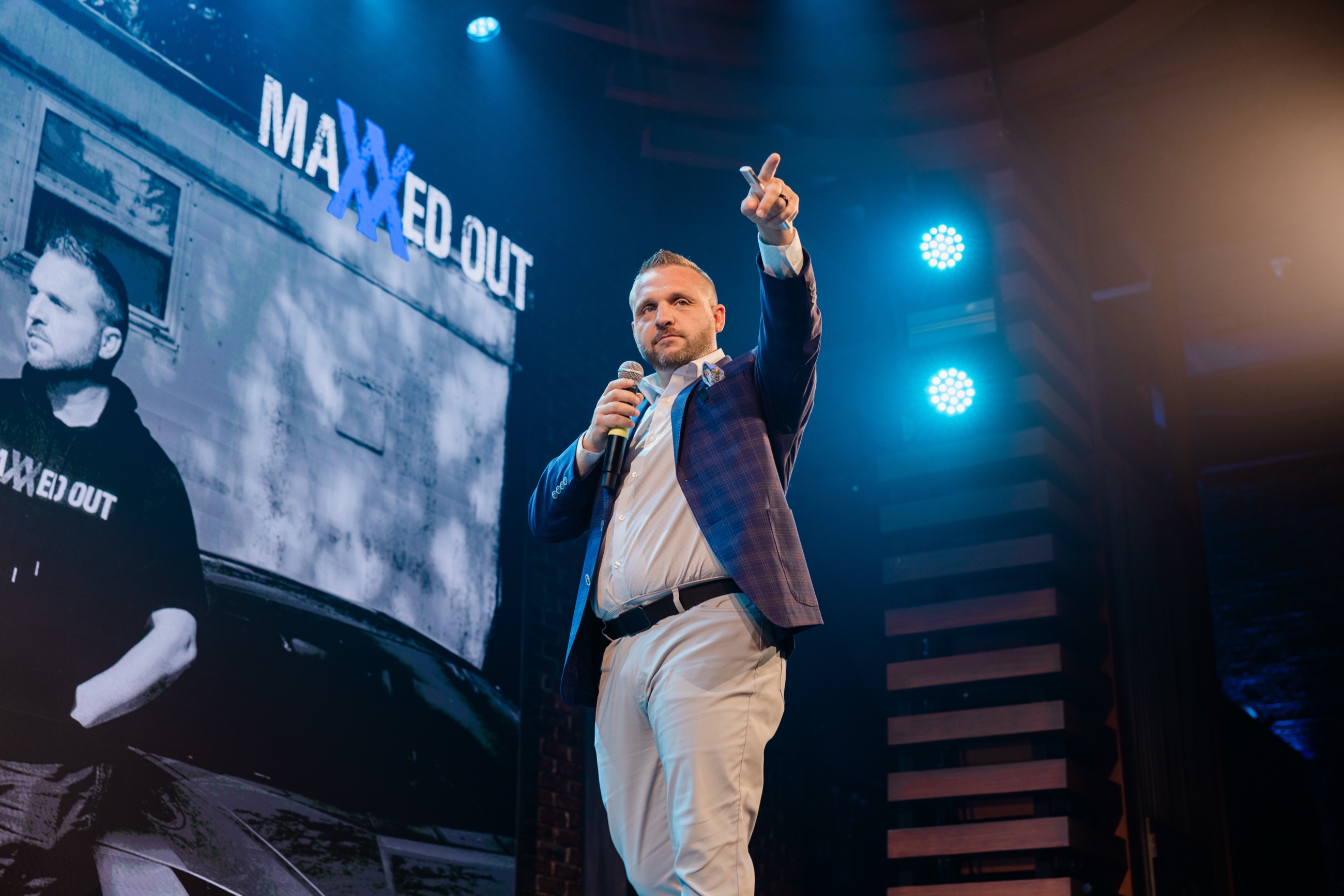 Todd Pultz speaking on stage